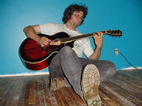teaching playing the guitar